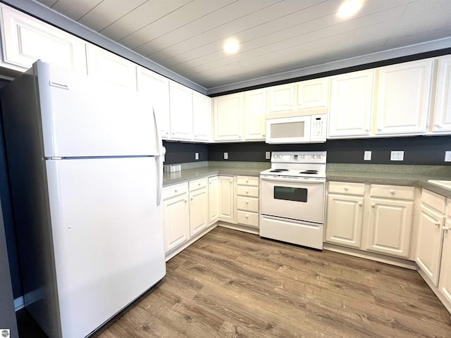 624 S Lake St, Cadillac, MI 49601 - kitchen with white cabinets, wooden ceiling, white appliances, and wood finished floors