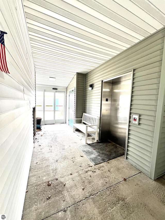 624 S Lake St, Cadillac, MI 49601 - view of patio featuring elevator