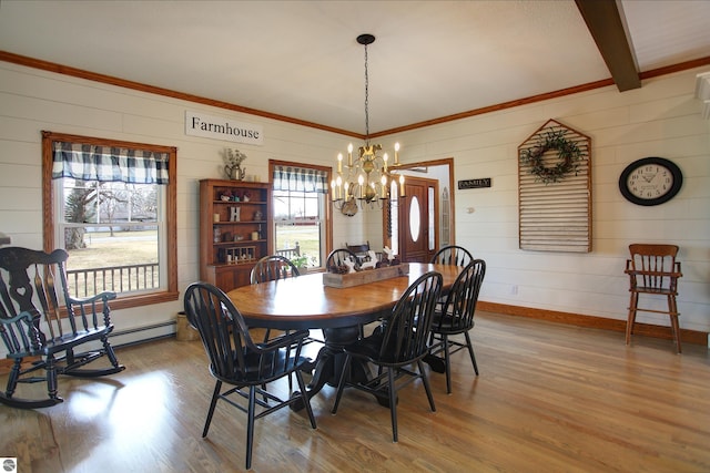 dining room with beam ceiling, baseboards, a chandelier, and wood finished floors