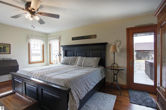 bedroom with wood finished floors, ceiling fan, and baseboards