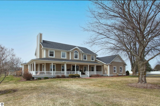 view of front facade with a chimney, a front lawn, a shingled roof, and a porch