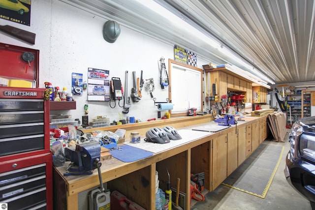 garage with a workshop area