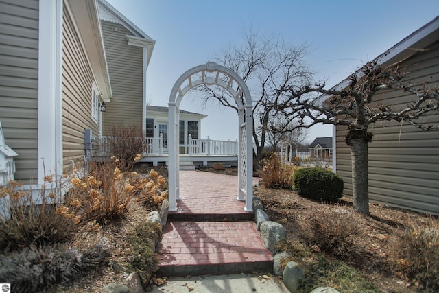view of yard featuring a wooden deck