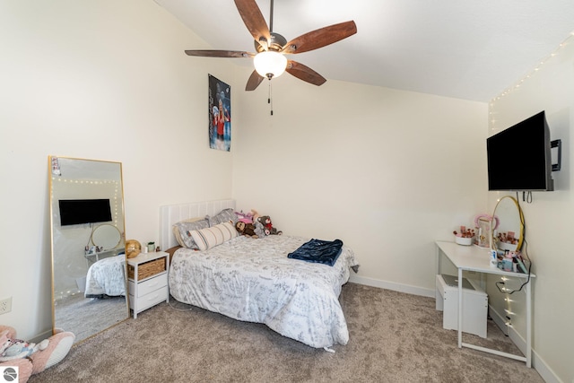 bedroom featuring baseboards, a ceiling fan, lofted ceiling, and carpet floors
