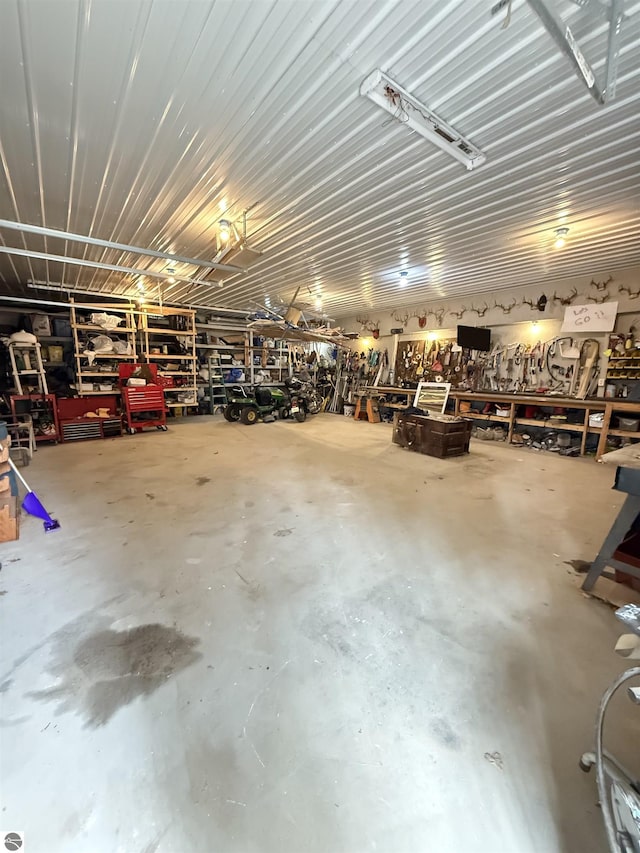 garage with a workshop area