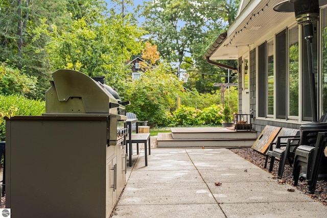 view of patio / terrace featuring exterior kitchen