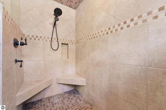 interior space with a tile shower