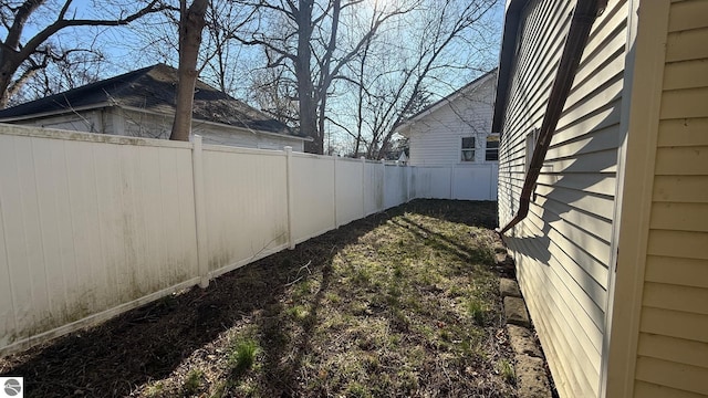 303 W Washington Ave, Saint Louis, MI 48880 - view of yard featuring fence