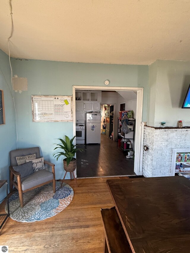 303 W Washington Ave, Saint Louis, MI 48880 - interior space with wood finished floors