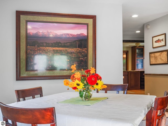 dining room featuring recessed lighting