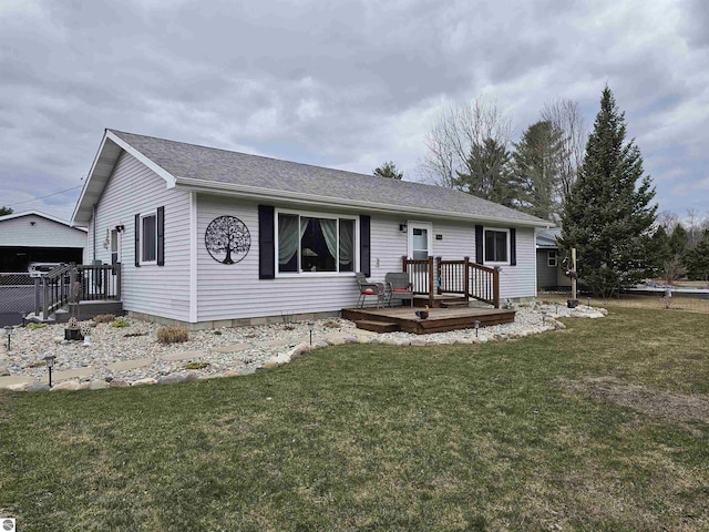 3042 Brodie Rd, South Branch, MI 48761 - single story home featuring a front yard and a deck