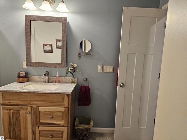 3042 Brodie Rd, South Branch, MI 48761 - bathroom with vanity and baseboards