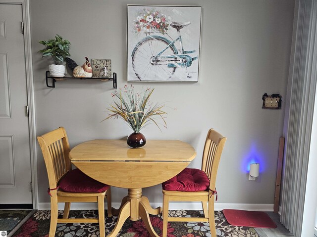 3042 Brodie Rd, South Branch, MI 48761 - dining area featuring baseboards