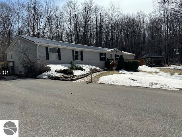 view of front of property with metal roof