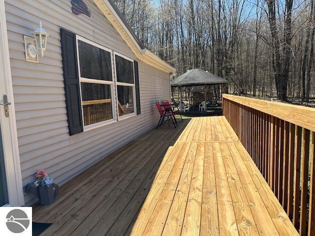 4607 Del Mason Rd, Bellaire, MI 49615 - deck featuring a gazebo