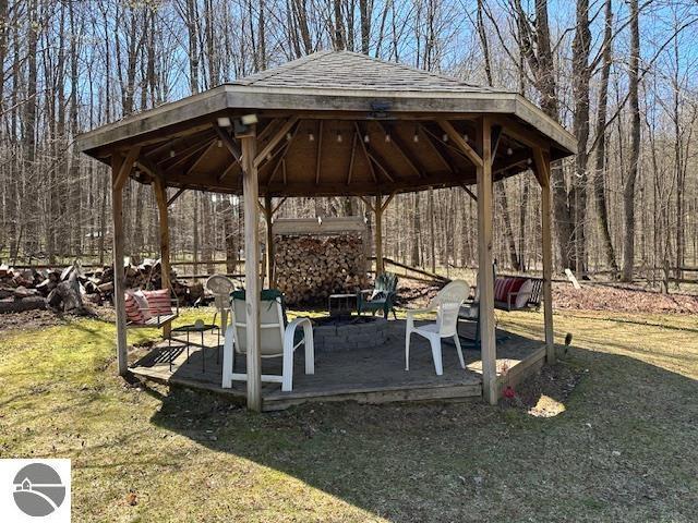 4607 Del Mason Rd, Bellaire, MI 49615 - view of home's community featuring a yard and a gazebo