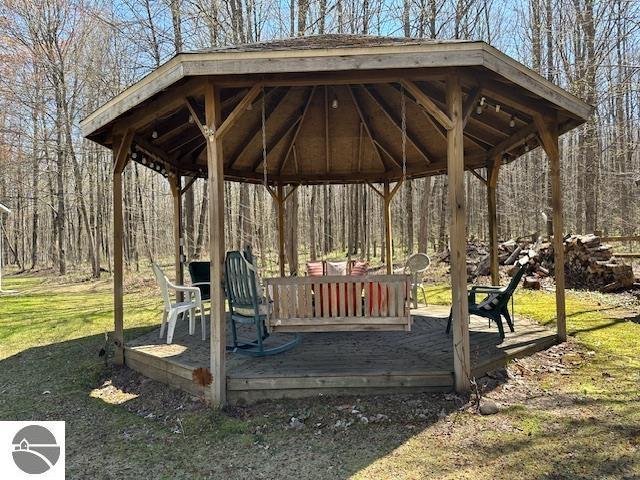4607 Del Mason Rd, Bellaire, MI 49615 - view of property's community with a gazebo and a deck
