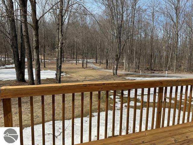view of snow covered deck