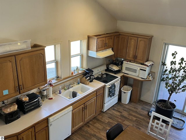 5071 Corey Rd, Mancelona, MI 49659 - kitchen featuring dark wood-style flooring, a sink, white appliances, light countertops, and under cabinet range hood