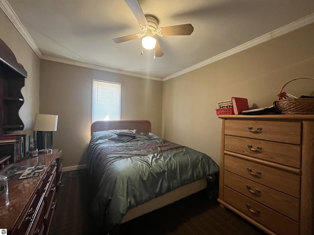 5071 Corey Rd, Mancelona, MI 49659 - bedroom with baseboards, ornamental molding, ceiling fan, and dark wood-type flooring