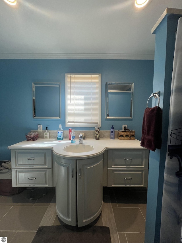5071 Corey Rd, Mancelona, MI 49659 - bathroom featuring crown molding and vanity