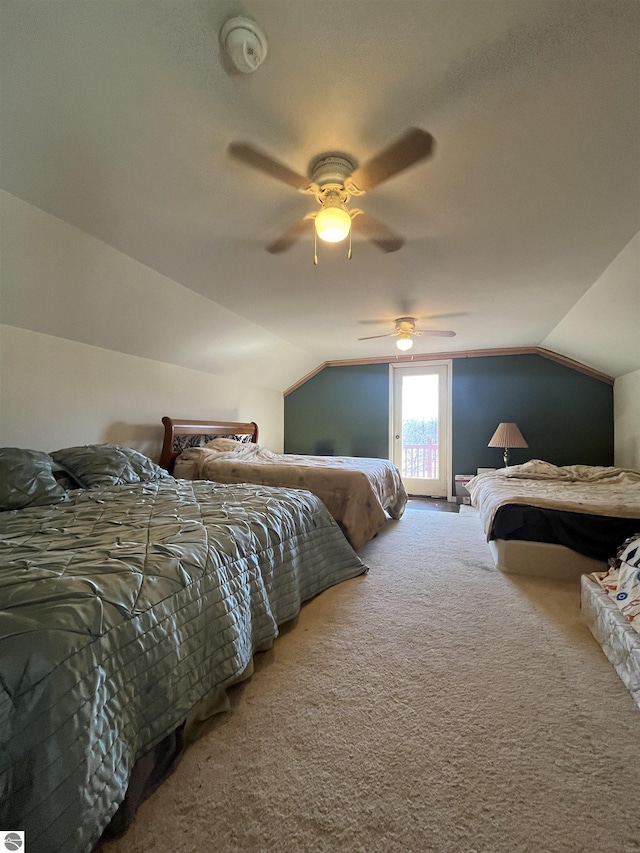 5071 Corey Rd, Mancelona, MI 49659 - bedroom featuring a ceiling fan, carpet, and lofted ceiling