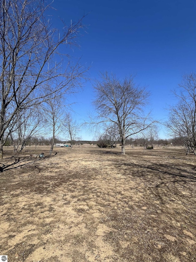 5071 Corey Rd, Mancelona, MI 49659 - view of yard with a rural view