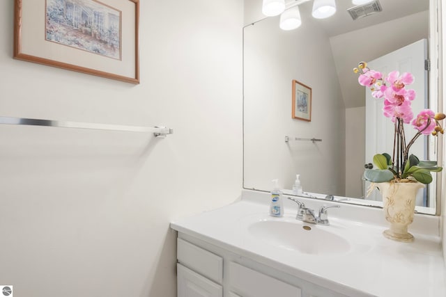5000 Townhouse Dr, Cedar, MI 49621 - bathroom featuring vanity and visible vents
