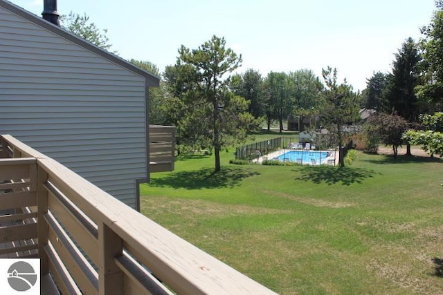 5000 Townhouse Dr, Cedar, MI 49621 - view of yard featuring a fenced in pool