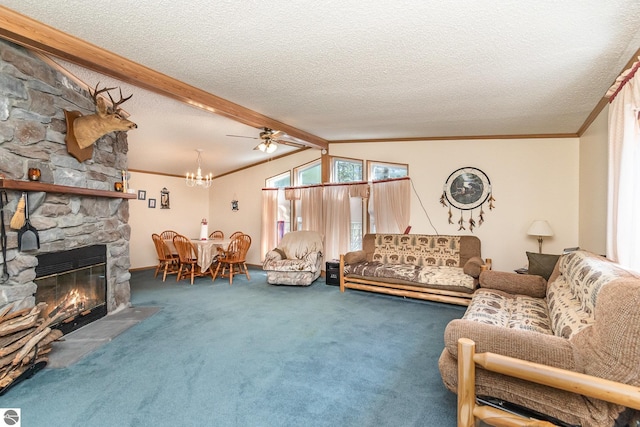 carpeted living room with ornamental molding, lofted ceiling with beams, a chandelier, a fireplace, and a textured ceiling