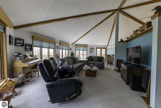 carpeted living area with a notable chandelier, a textured ceiling, and vaulted ceiling with beams