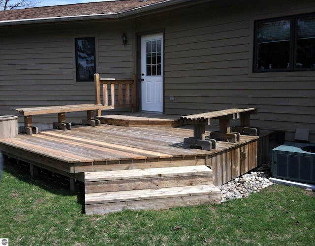 wooden terrace featuring central air condition unit