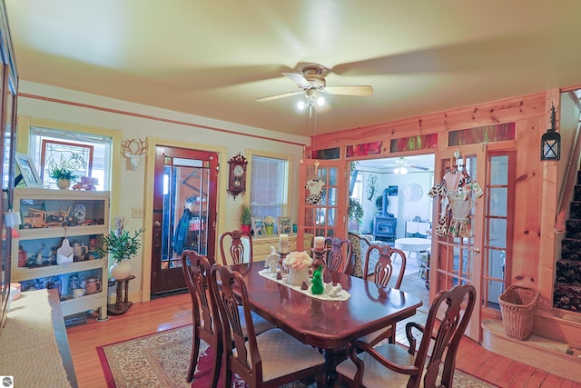 2587 S Coldwater Rd, Mount Pleasant, MI 48858 - dining room with french doors, a ceiling fan, and wood finished floors