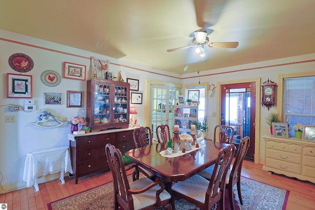 2587 S Coldwater Rd, Mount Pleasant, MI 48858 - dining space with light wood finished floors and ceiling fan