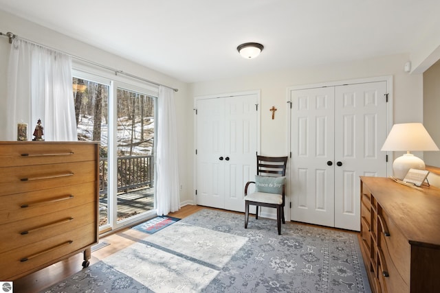 interior space featuring visible vents and wood finished floors