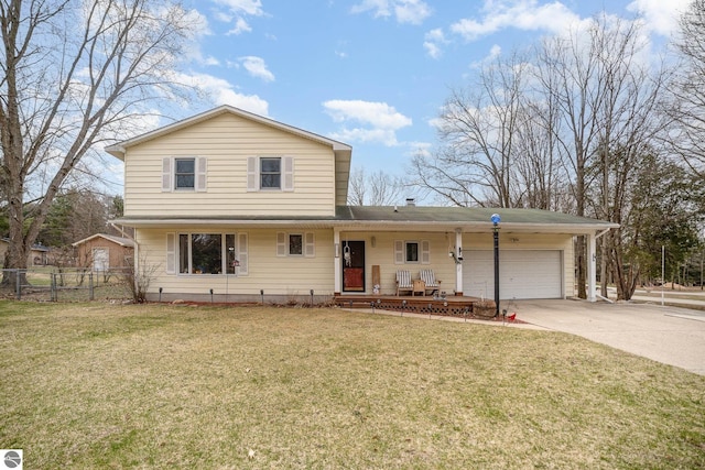 4631 Cardinal Dr, Mount Pleasant, MI 48858 - traditional home featuring an attached garage, driveway, fence, and a front lawn