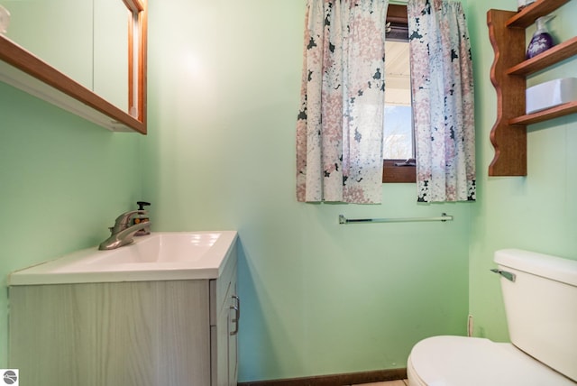4631 Cardinal Dr, Mount Pleasant, MI 48858 - half bath featuring toilet and vanity