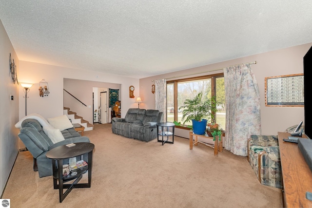 4631 Cardinal Dr, Mount Pleasant, MI 48858 - carpeted living area featuring stairway and a textured ceiling