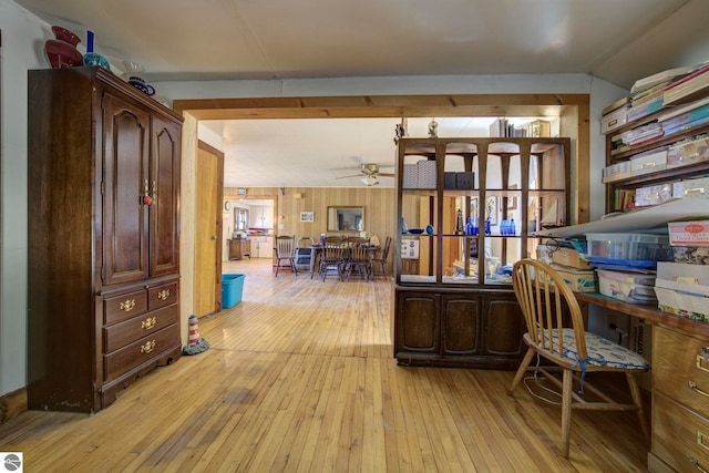 office space featuring light wood-type flooring and a ceiling fan