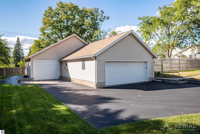 garage with fence