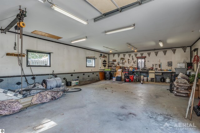 garage with a workshop area