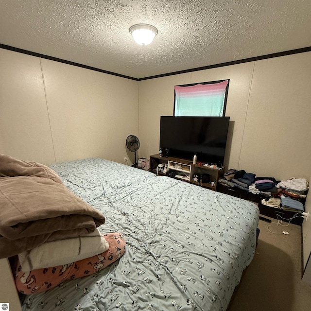 1279 Beacon Hill Ct, Mount Pleasant, MI 48858 - bedroom featuring a textured ceiling, a decorative wall, and ornamental molding