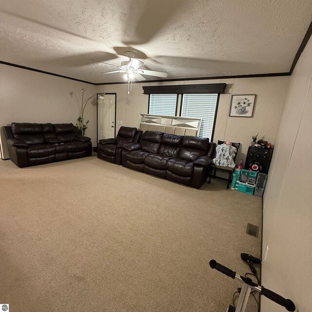 1279 Beacon Hill Ct, Mount Pleasant, MI 48858 - living area featuring carpet flooring, a textured ceiling, ornamental molding, and ceiling fan