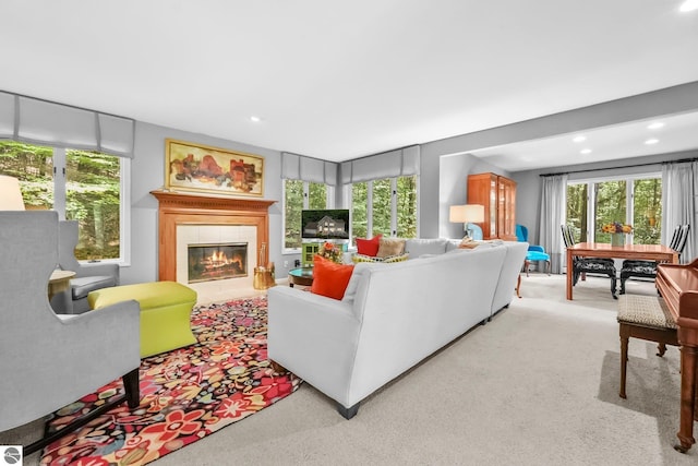 2127 E Timberlane Dr, Traverse City, MI 49686 - living room with a wealth of natural light, carpet flooring, and a tile fireplace