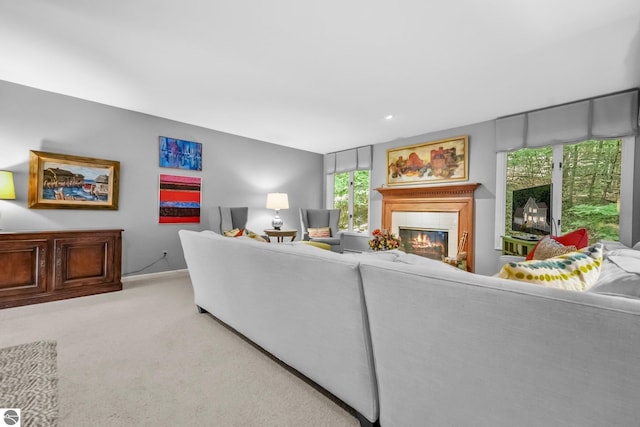 2127 E Timberlane Dr, Traverse City, MI 49686 - living room with recessed lighting, a tiled fireplace, and carpet