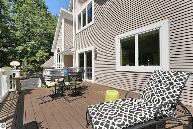 2127 E Timberlane Dr, Traverse City, MI 49686 - deck featuring outdoor dining space