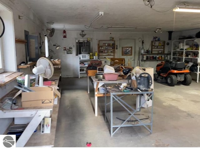 garage with a workshop area