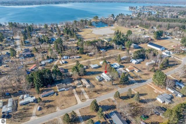 birds eye view of property featuring a water view