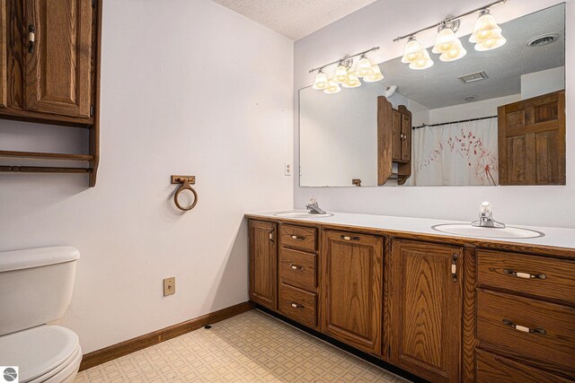 4676 W Mcmillan Rd, Muskegon, MI 49445 - bathroom with tile patterned floors, visible vents, a sink, and toilet