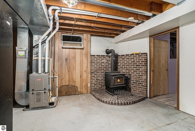 4676 W Mcmillan Rd, Muskegon, MI 49445 - unfinished basement with a wood stove
